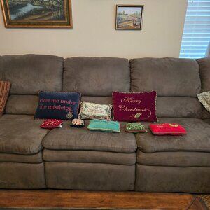 Nine Christmas Couch Pillows and Door Hangers